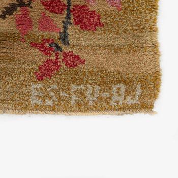 A knotted pile carpet, c. 275 x 177 cm, signed ES-FV-AJ.