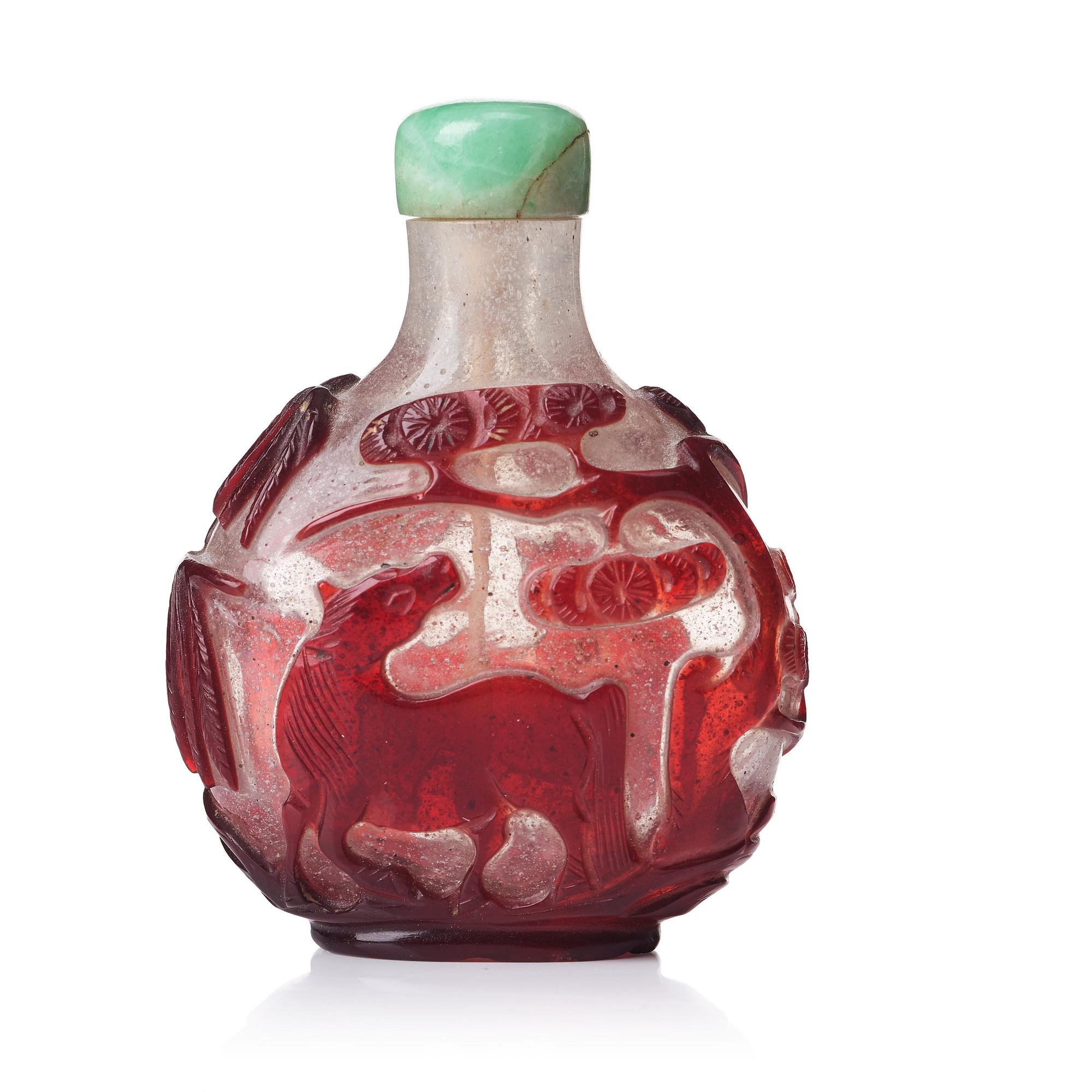 A peking glass snuff bottle with stopper, Qing dynasty, 19th Century.
