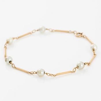 Armband, 18K guld med pärlor.