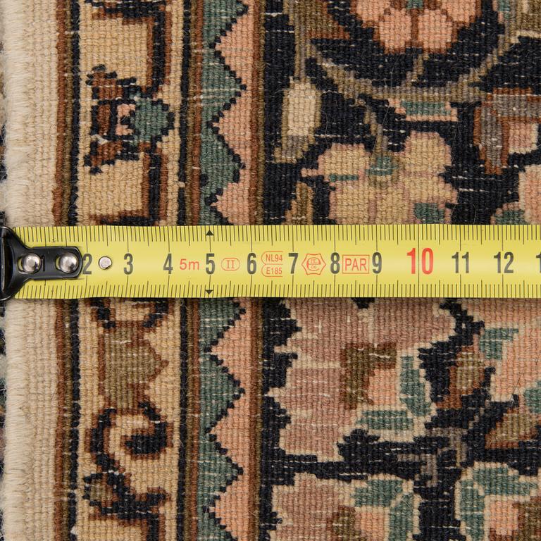 A Kashmir carpet, silk on cotton warp. Circa 185 x 125 cm.