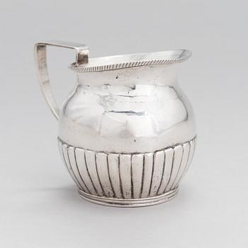 A silver, cream jug, Cyrillic maker's mark Sinkoni, Finland 1824.