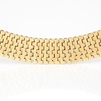 HALSBAND trefärgat guld med graverad lövdekor.