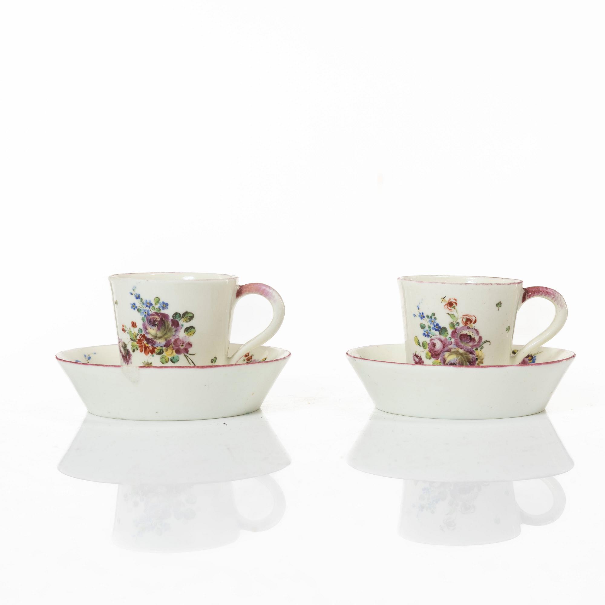 A pair of cups and saucers, France, 18th Century.