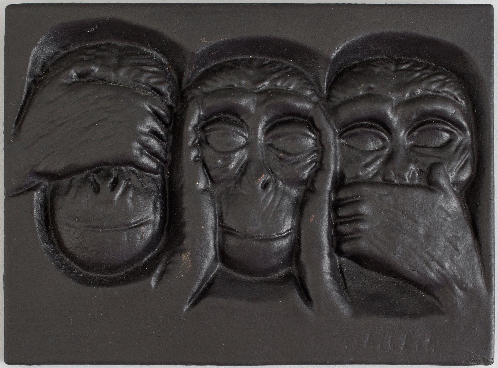 MICHAEL SCHILKIN, a cast iron plaque "See no evil, hear no evil, say no evil", signed and dated Högfors 1961.
