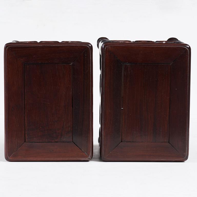 A pair of hardwood pidestals, China, early 20th Century.