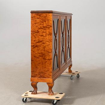Display cabinet, 1920s.