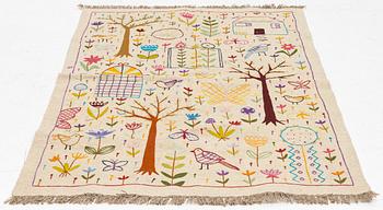 A hand-embroidered Kelim rug, c. 177 x 122 cm.