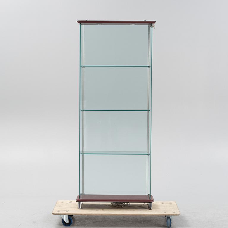 A glass display cabinet, Cattelan, Italy, 21st Century.