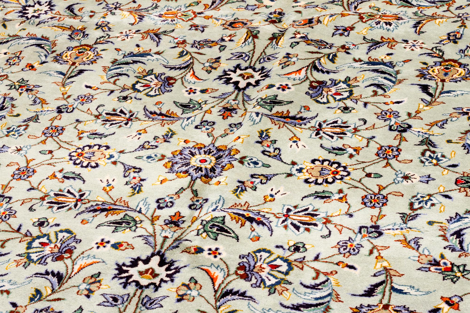 A Keshan rug, 412 x 305 cm.