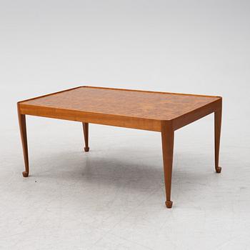 A Josef Frank mahogany and elm root model 2073 coffee table, designed 1949.