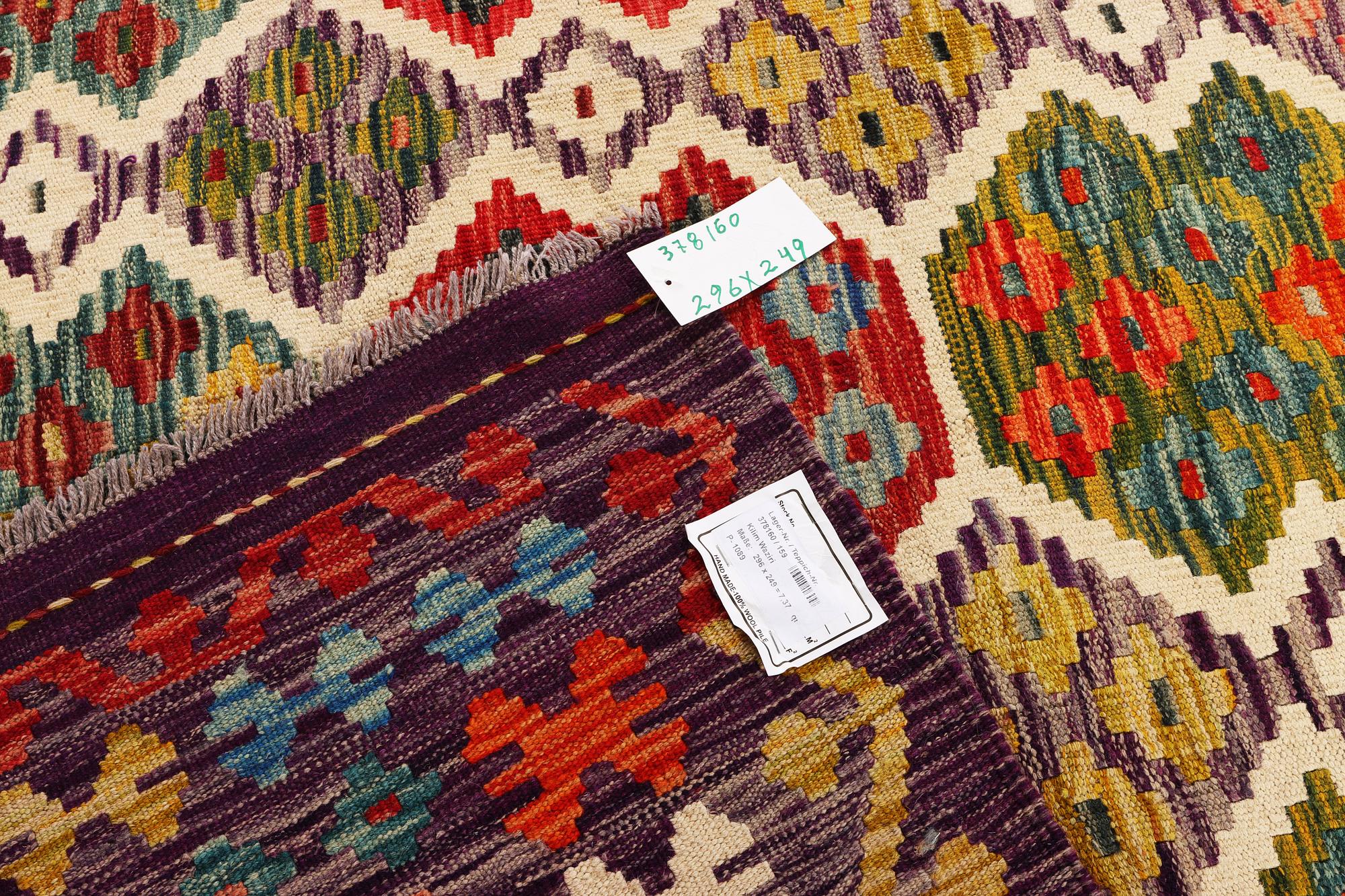 A Afghan Kelim, c. 296 x 249 cm.