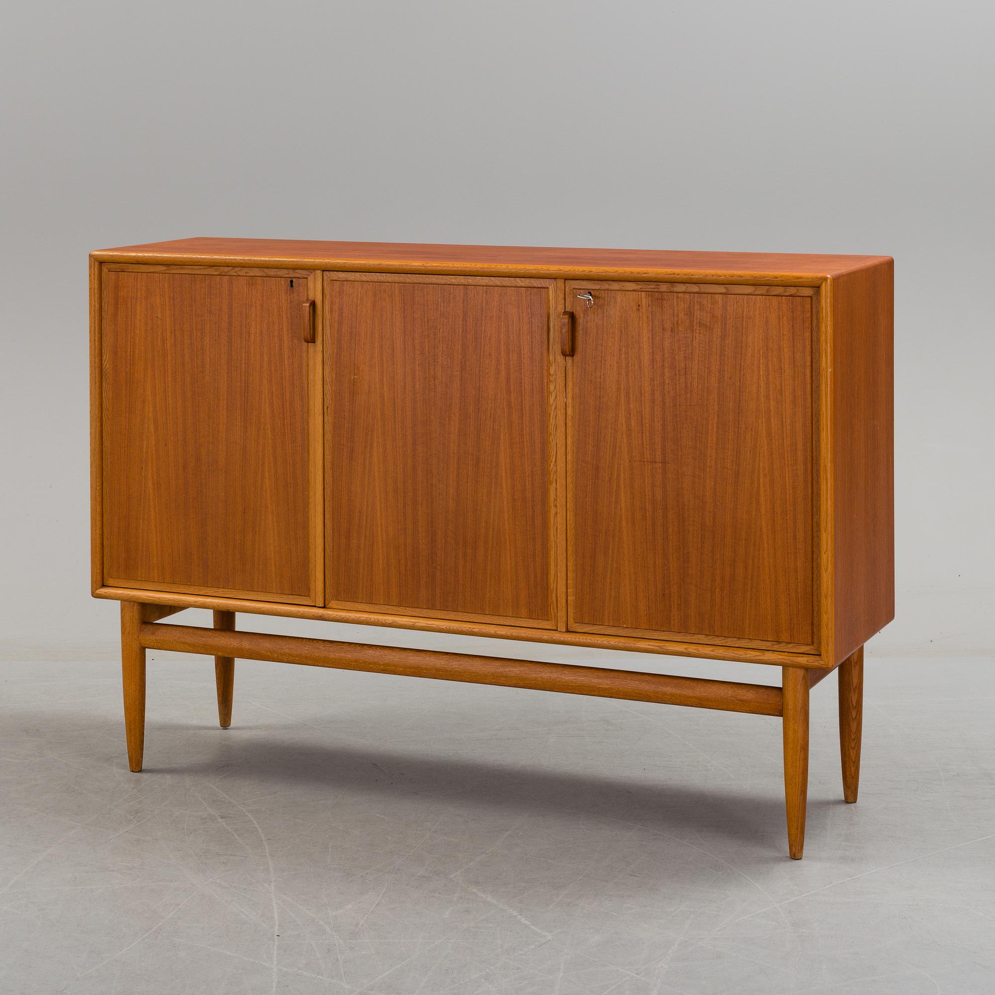 A teak veneered sideboard by Bertil Fridhagen, Bodafors, 1959.