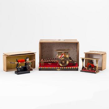 A group of Japanese lacquered objects in wooden crates, early 20th Century.