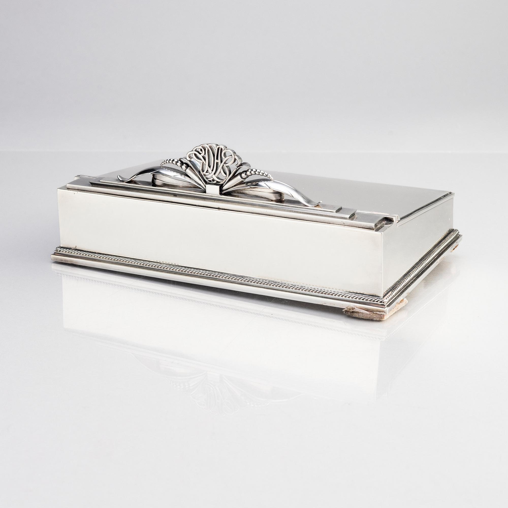Atelier Borgila, skrivschatull/skrin, Stockholm 1953, sterling silver samt CG Hallberg, brevkniv, silver, Stockholm 1926.