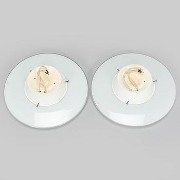 Arne Jacobsen, a pair of 1960's 'AJ-Eklipta' ceiling / wall lamps, for Louis Poulsen/licensed manufacturer Orno, Stockmann.