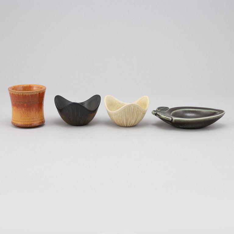 Gunnar Nylund, a stoneware wall relief, three bowls, a vase and an ashtray, Rörstrand.