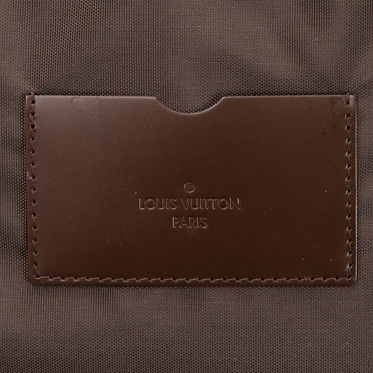 LOUIS VUITTON Damier Ebene Brown Pégase Suitcase with protective cover.