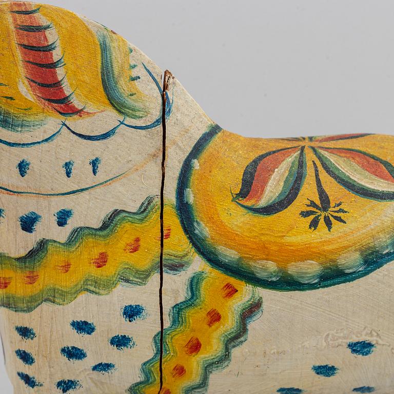 Two 20th century painted wooden horses.