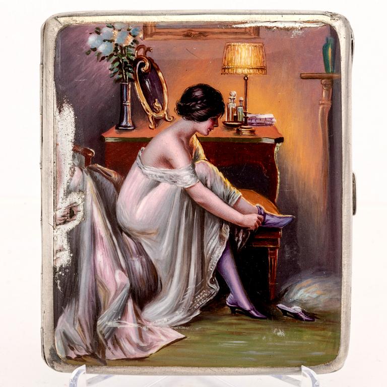 An early 1900s silver and enamel cigarette case, weight 162 grams.