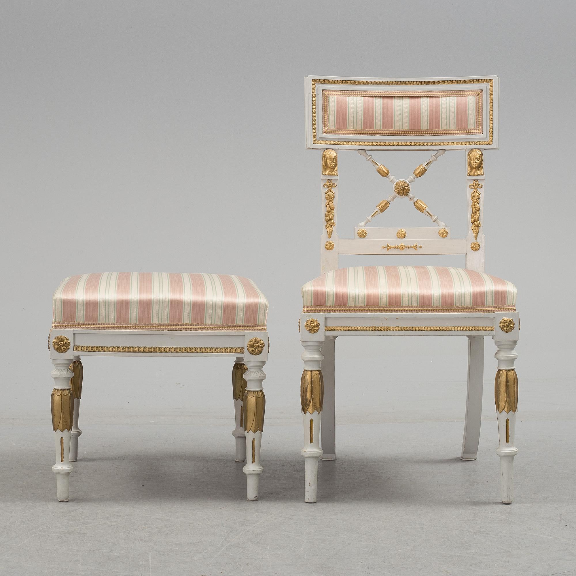 A set of two armchairs, a sofa, a stool and a chair. Early 20th century.