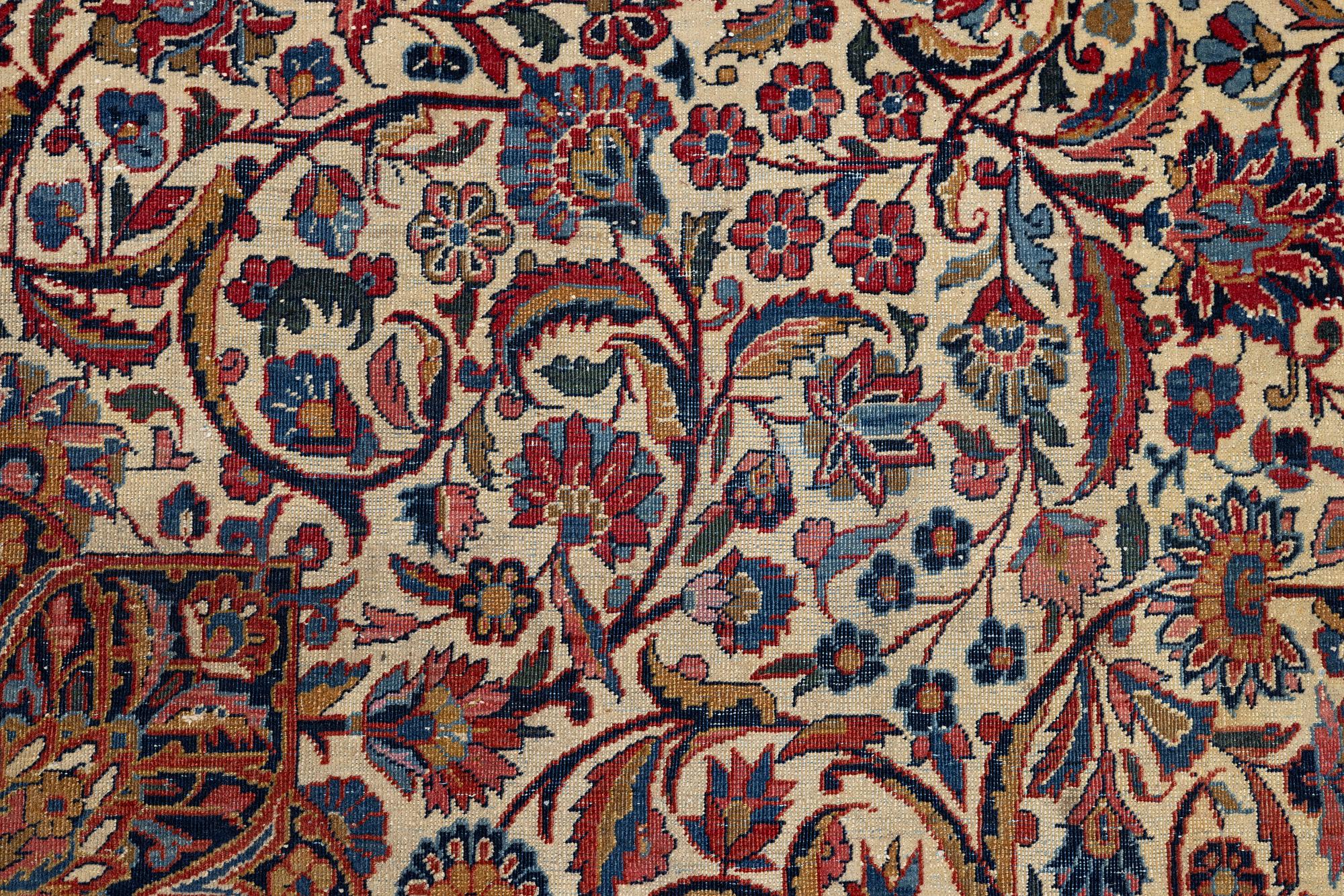 An antique Kashan Dabir carpet, c. 404 x 312 cm.