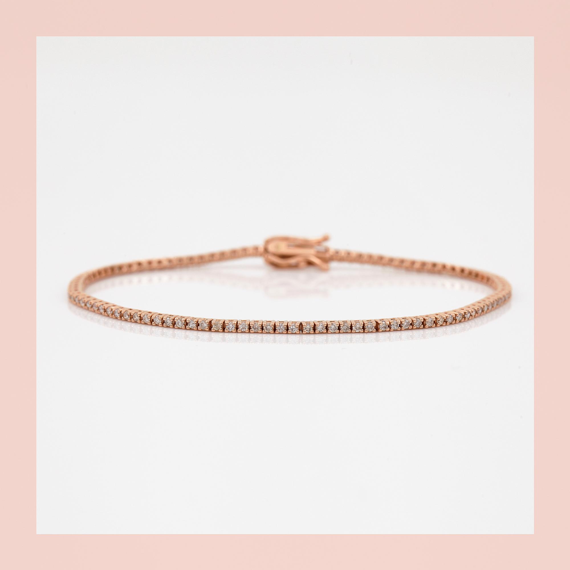 ARMBAND, ett riviére i rosa guld med briljanter, totalt ca 0.99ct.