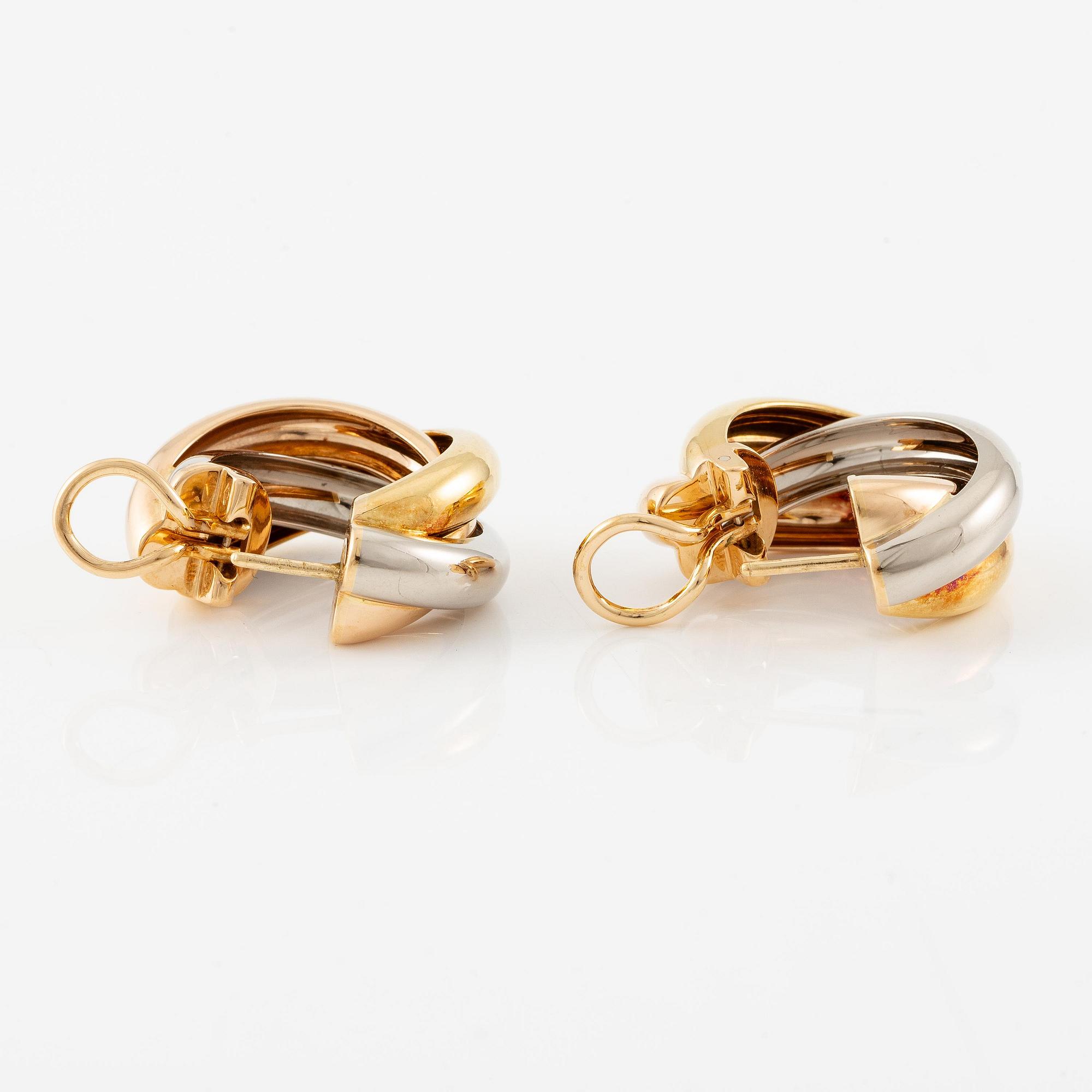 Cartier a pair of "Trinity" earrings in 18K gold in three colours.