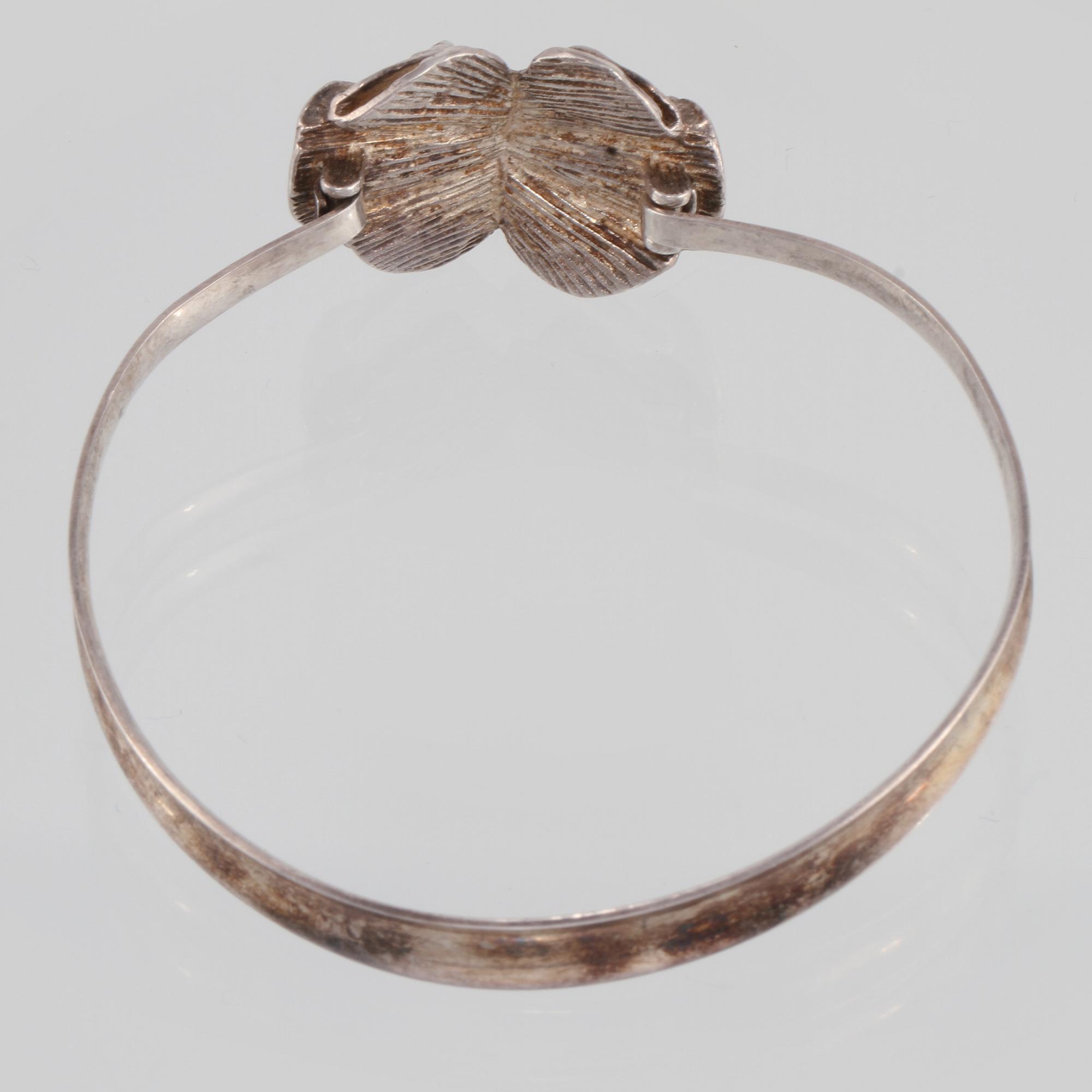 ARMRING, sterlingsilver, sannolikt Theresia Hvorslev för MEMA, Lund 1979. Vikt 15,8 gram.