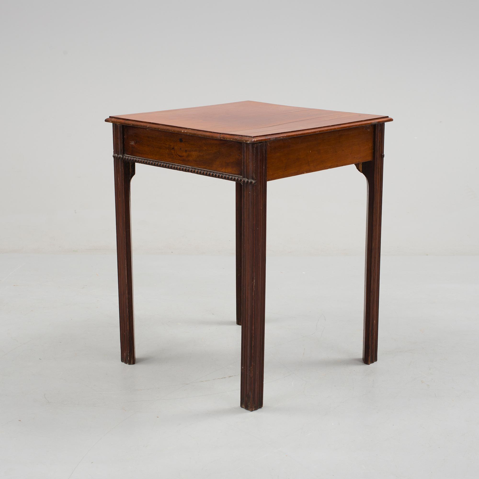 A early 19th century mahogany table.
