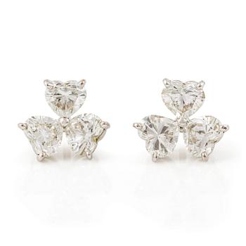 518. A pair of Cartier earrings in 18K white gold with six heart-shaped brilliant-cut diamonds.