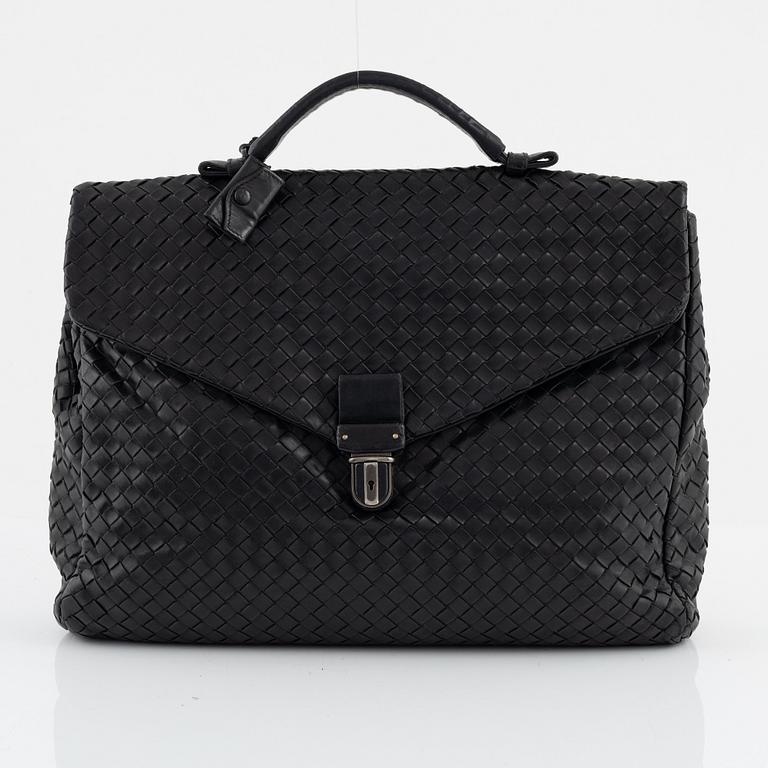Bottega Veneta, a black leather intrecciato briefcase.