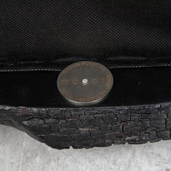 Maarten Baas, a promotional "Smoke dining chair" for Moooi,  after 2002.