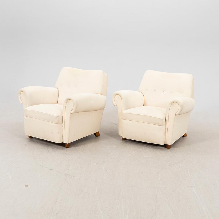A pair of Danish 1940s armchairs.