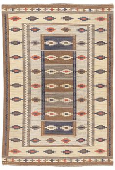 429. Märta Måås-Fjetterström, a carpet, "Ljusa mattan", flat weave, ca 300 x 205 cm, signed MMF.