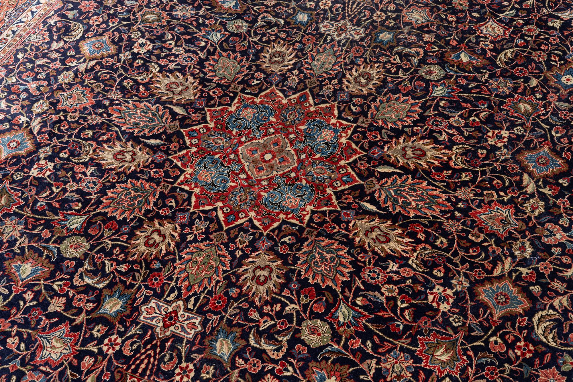 A Persian carpet, c. 445 x 320 cm.