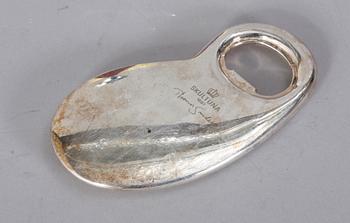 GASTÄNDARE samt KAPSYLÖPPNARE. Alessi resp Skultuna.