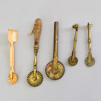 FIVE BAKING UTENSILS, bronze, bone and wood, 18th century.