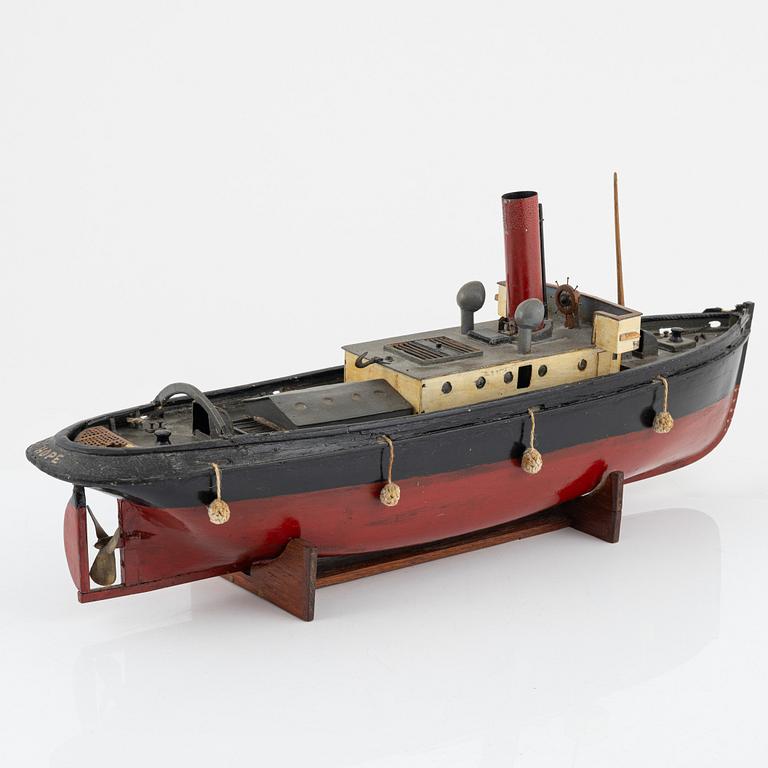 A ships model of a tugboat for a steam engine.