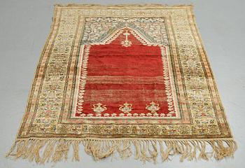 A rug, an antique Anatolia, probably Gördes (Ghiordes), a prayer rug, ca ca 188 x 124 cm.