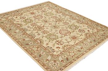 An oriental carpet with Mamluk design, c. 294 x 250 cm.