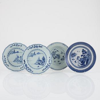 A group of four odd blue and white plates, Qing dynasty, Qianlong (1736-95).