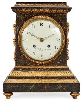 A late Gustavian wooden mantel clock by J. Nyberg.