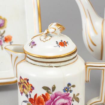 A group of four porcelain tea and coffe service, Germany,  19th century.