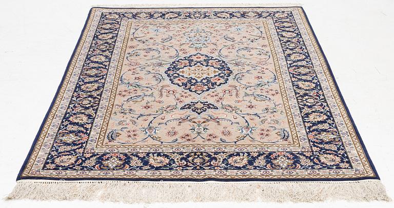 An Isfahan rug, c. 220 x 145 cm.