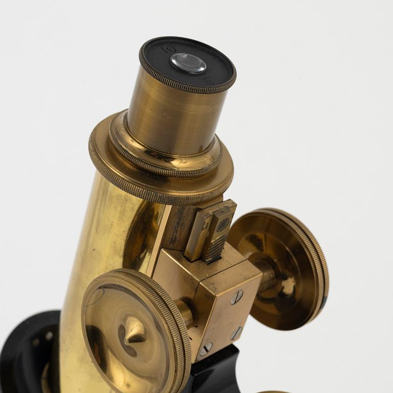 A microscope with accessories, Bausch & Lomb Optical Co. Rochester N.Y, early 20th Century.