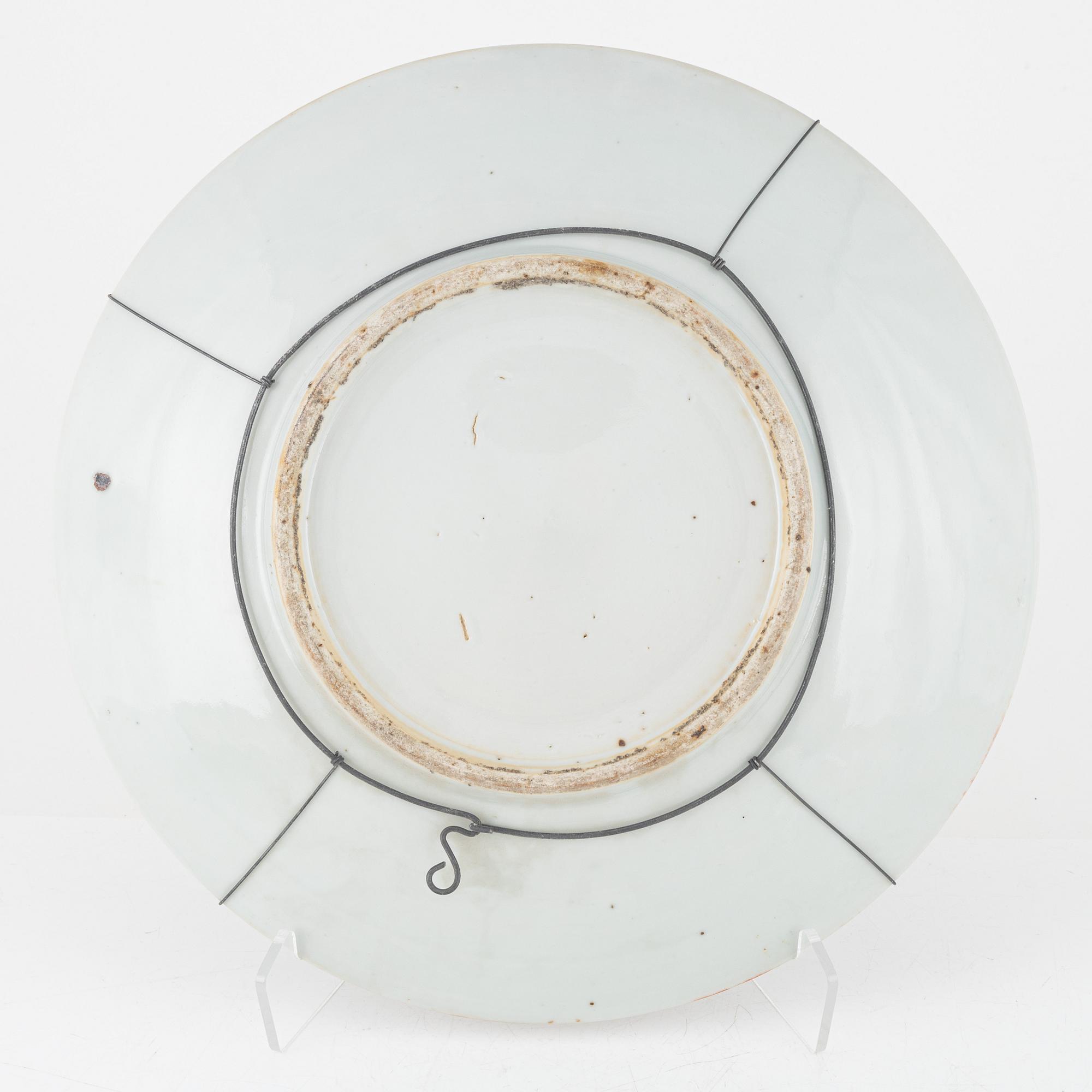 A Kanton porcelain dish and two porcelain plates, China, 19th century.