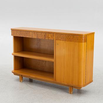 A Swedish Modern bookcase with cabinet, 1940's.