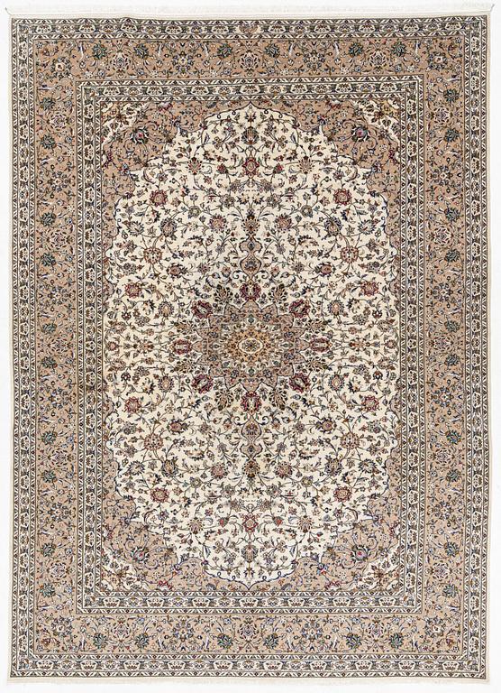 A Keshan carpet, signed, c. 405 x 290 cm.