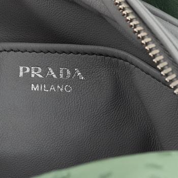 Prada, a green ostrich leather bag.