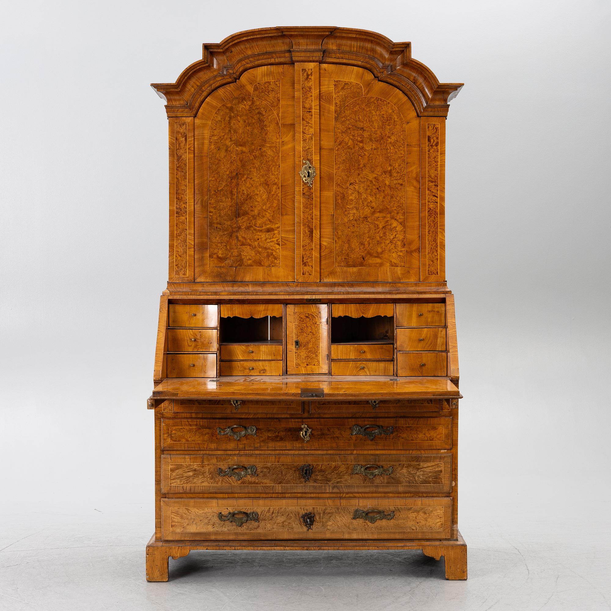 A Swedish rococo burr-alder veneered cabinet, later part 18th century.